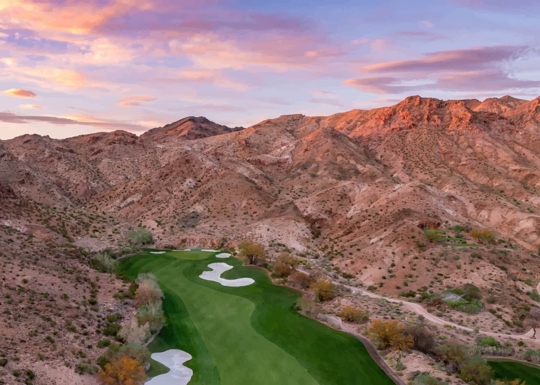 canyon fairways under a pink desert sky