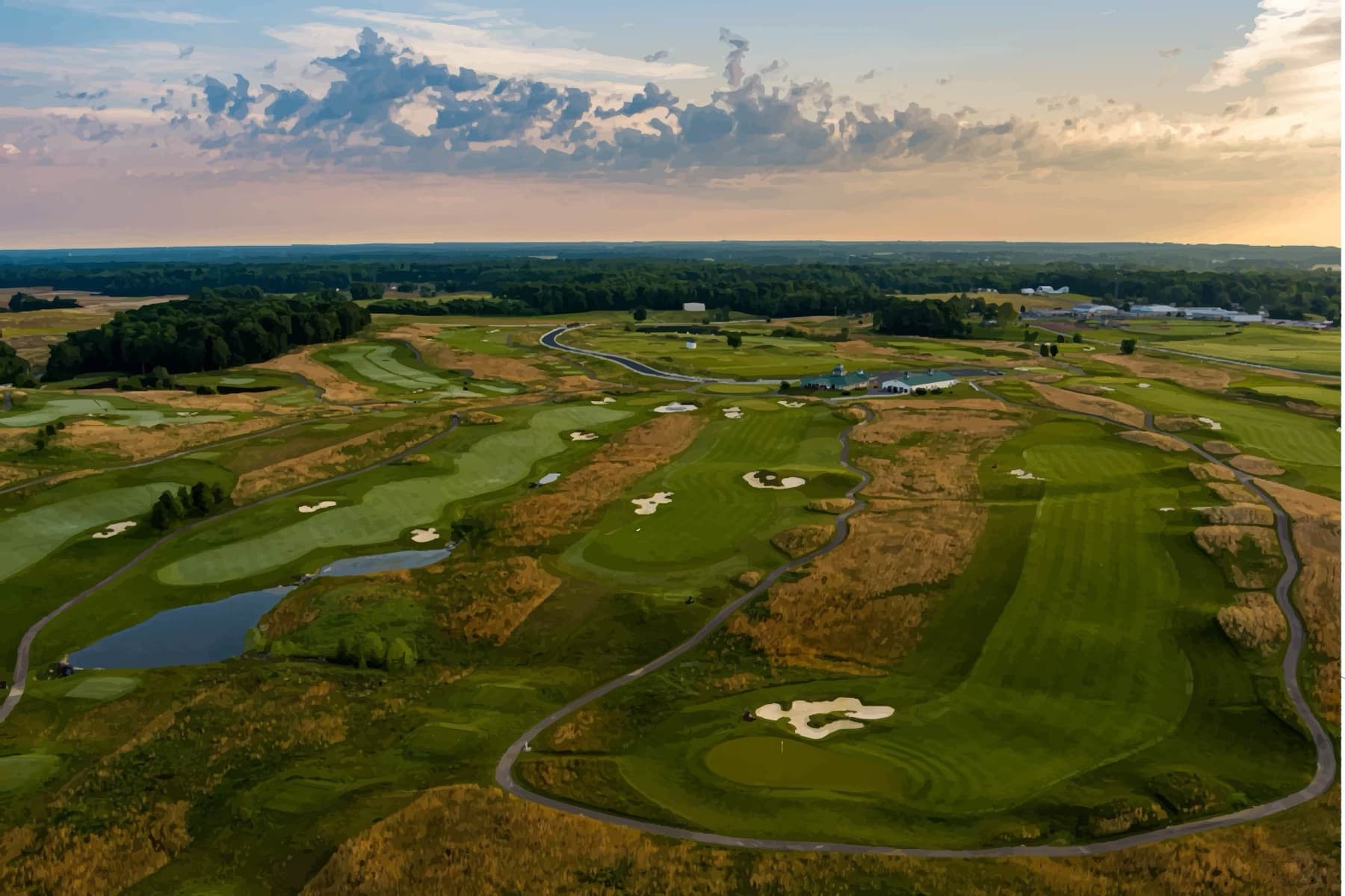 the routing sprawls toward the clubhouse at dusk