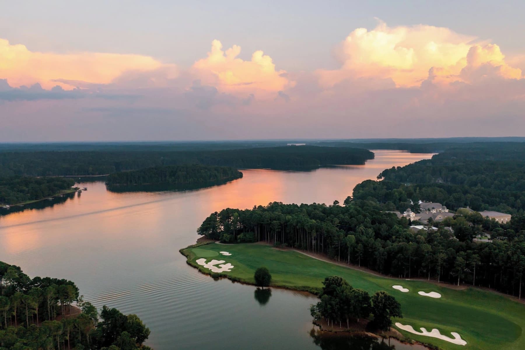 The Oconee running along a cove of Lake Oconee at sunset.
