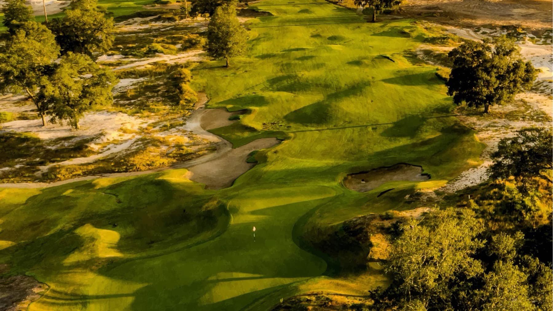 A golden-hour aerial over The Squeeze